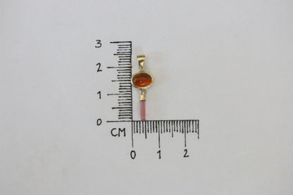 Oranje toermalijn cabochon met roze ruwe toermalijn hanger